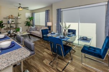 Dining table and chair near kitchen at Level 25 at Sunset by Picerne, Las Vegas, 89113
